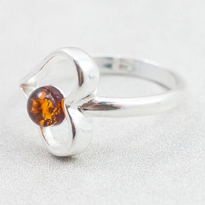 Minimalist Heart Ring In Baltic Amber And Sterling Silver for wholesale by Marcin Waryszak