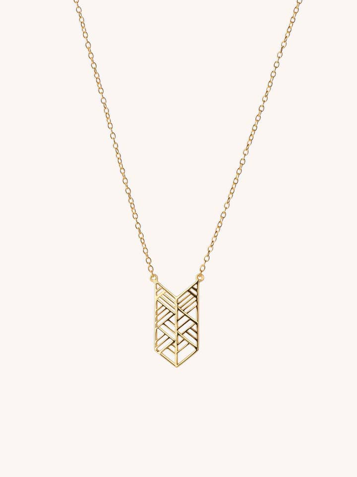 Collier ETHNIC plaqué or 18 carats pour la vente par Aran Jewels