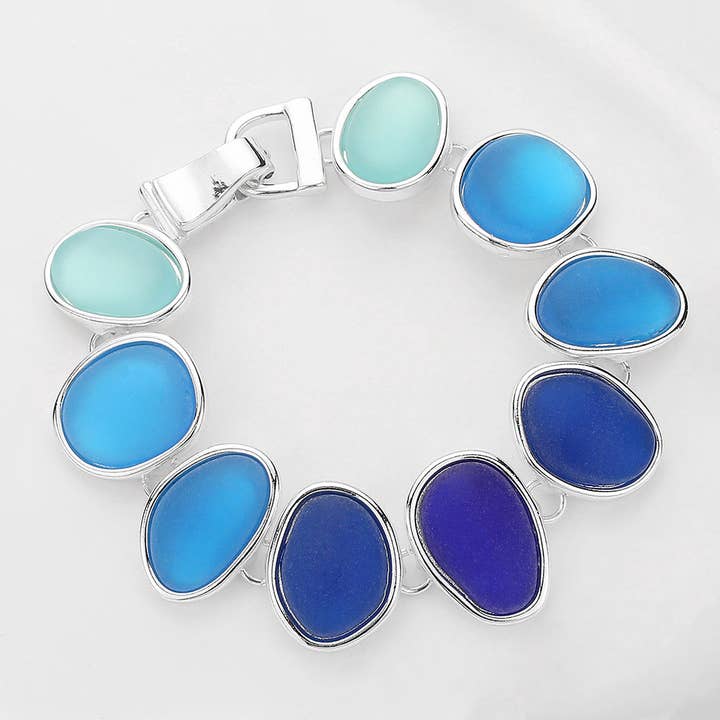 Blue Shade Multi Colored Sea Glass Dome Magnetic Bracelet
for wholesale by Sensibling Corp.