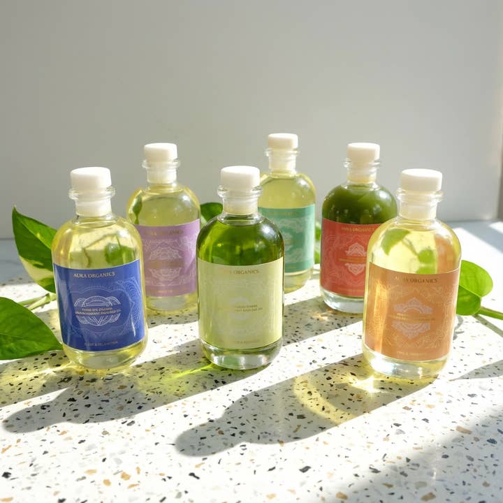 Chakra Massage Oil Collection for wholesale by Aura Organics Ltd