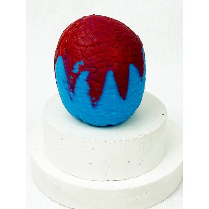 MIX COLOR Treasure Box Reversible Dinosaur Egg Squishies for wholesale on Faire
