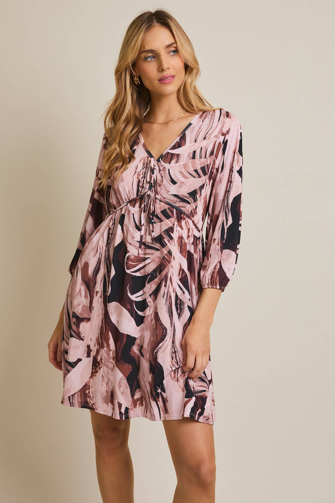 V-NECK FRONT TIE LONG SLEEVE ABSTRACT MINI DRESS for wholesale on Faire