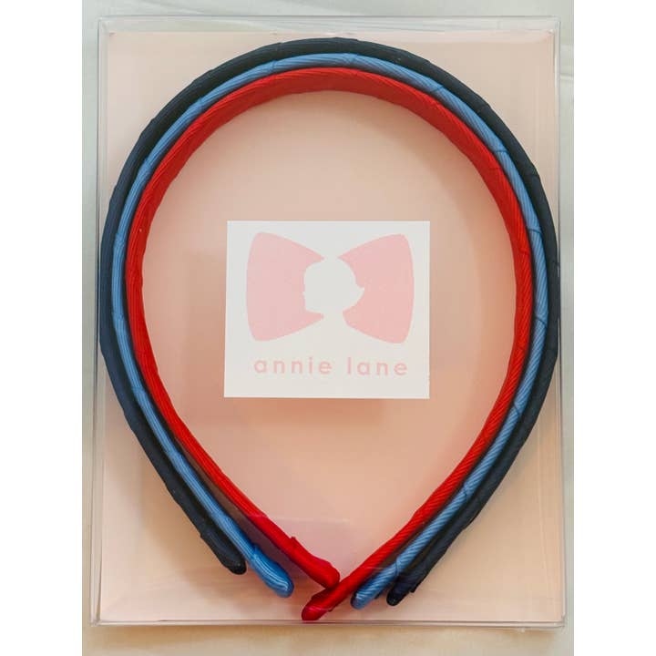 Set med tre pannband - marinblå/röd/blå för wholesale av Annie Lane