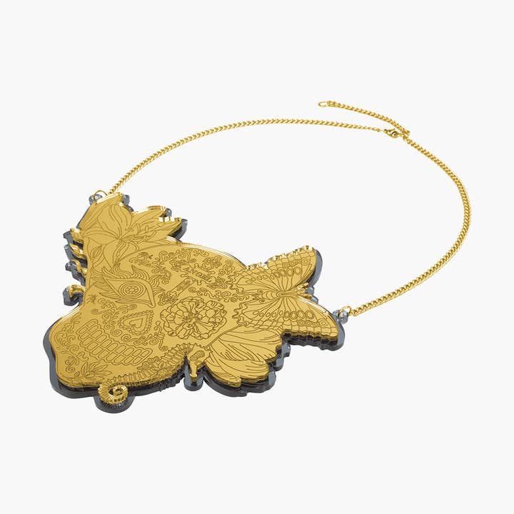 CATRINA NECKLACE SKULL - BIG / GOLD METALLIC ACRYLIC for wholesale by Rijkje Jewelry