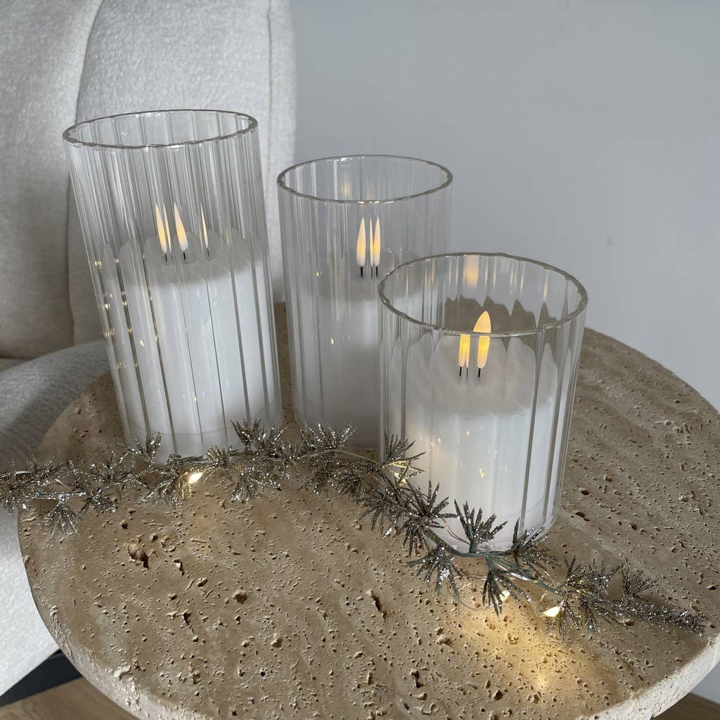 3 LED candles in flat-sided white glasses - remote control (battery operated) for wholesale on Faire1