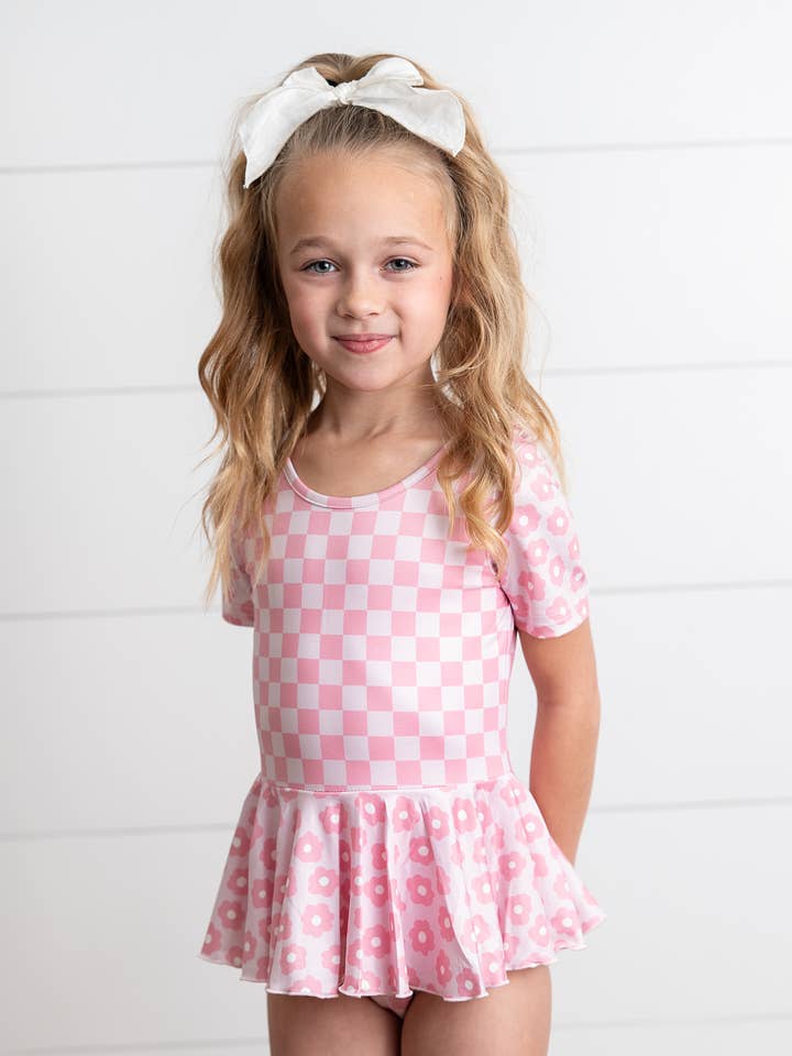 Kids Pinky Check Flower Skirted Dance Gymnastics Leotard for wholesale by Oopsie Daisy