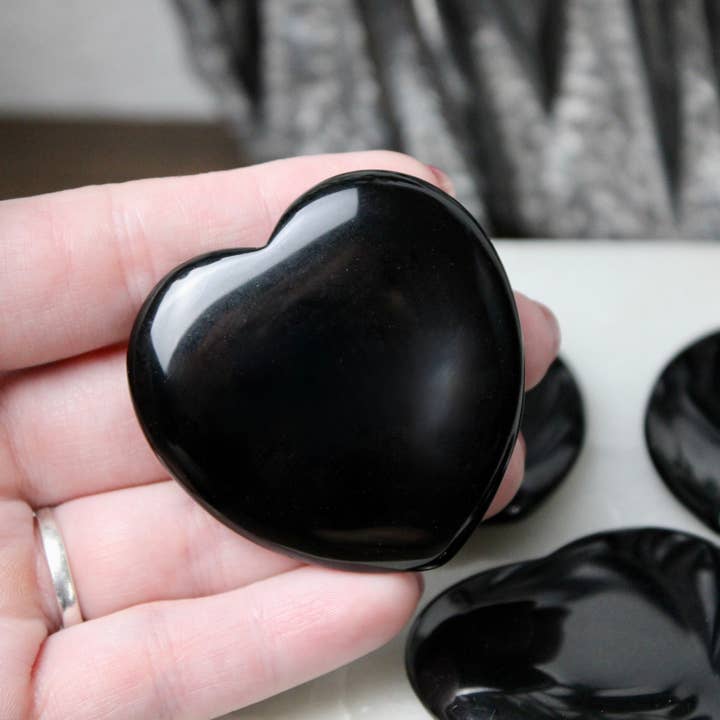 Black Obsidian Heart Stone Carving – Polished Crystal for Protection, Grounding & Emotional Healing, Pocket Stone or Palm Stone for wholesale by EC Plugs and Gems