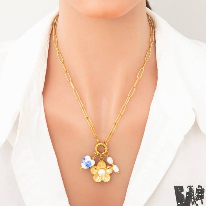 GOLD FLORAL PORCELAIN PEARL CLUSTER CHARM NECKLACE | 80N91614 for wholesale on Faire
