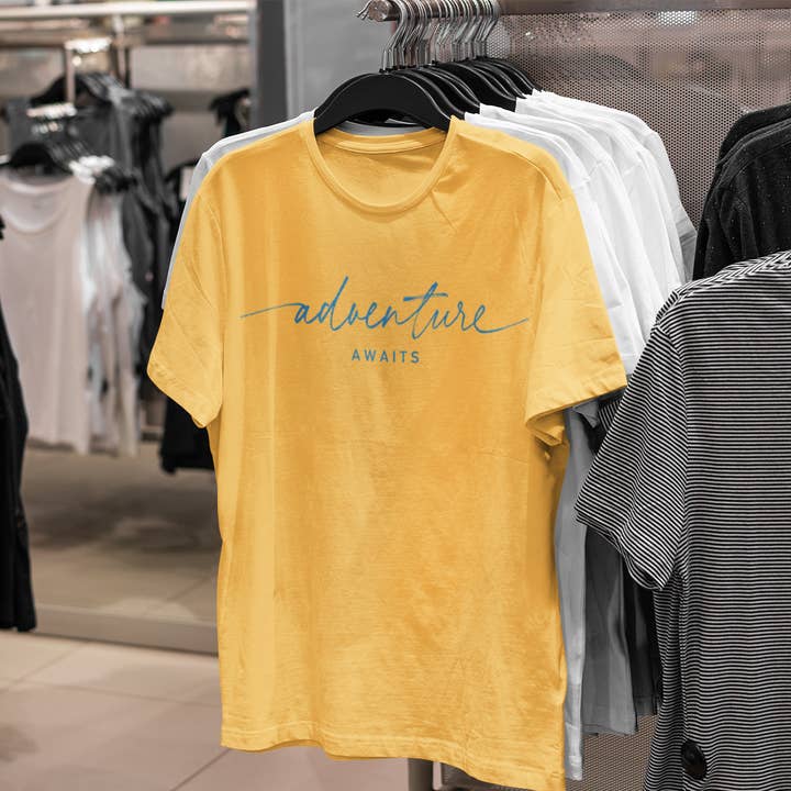 T-Shirt Huef « Adventure Awaits » pour la vente par DesignSkinz