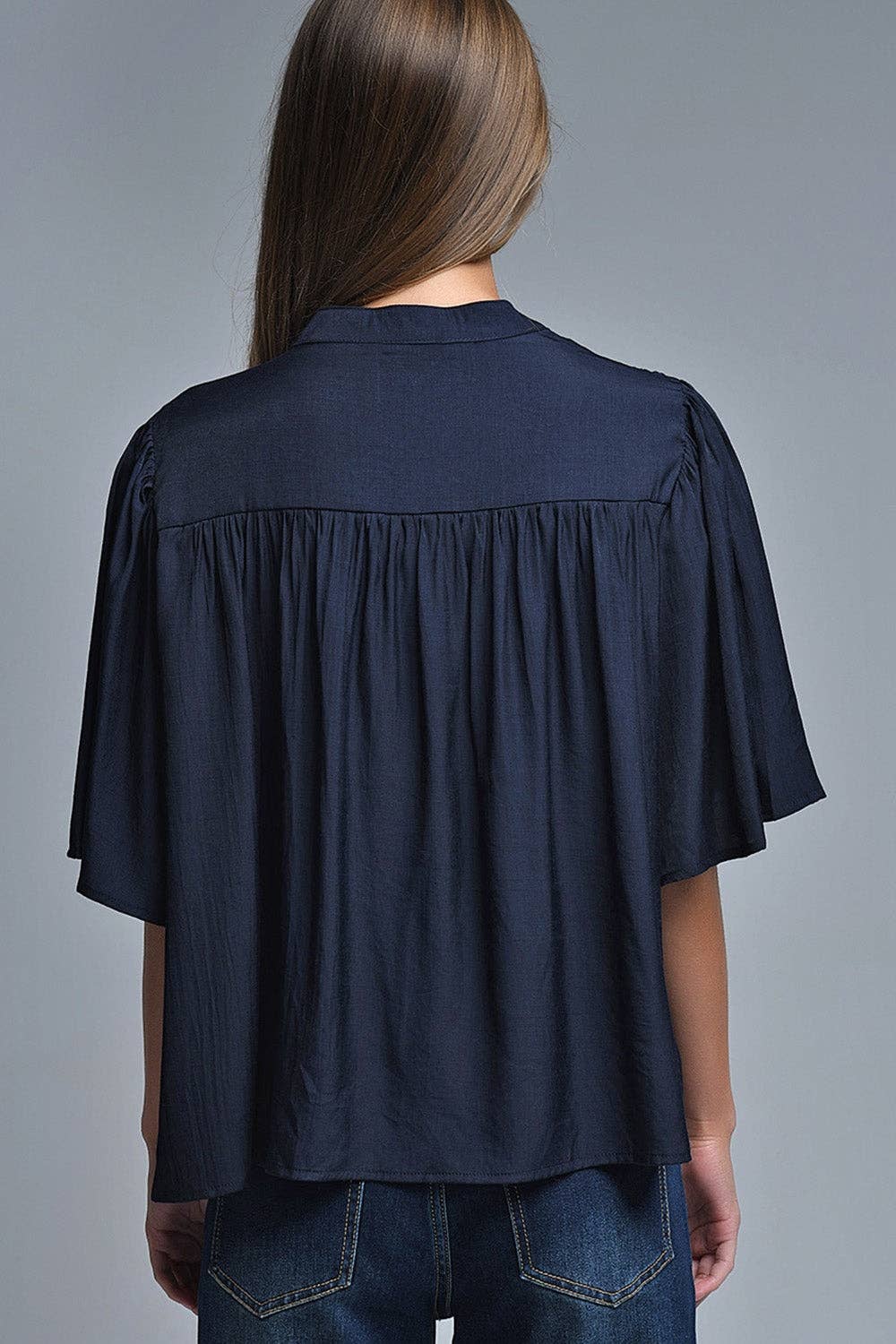 Relaxed Navy boho-style blouse with embroidered details for wholesale on Faire1
