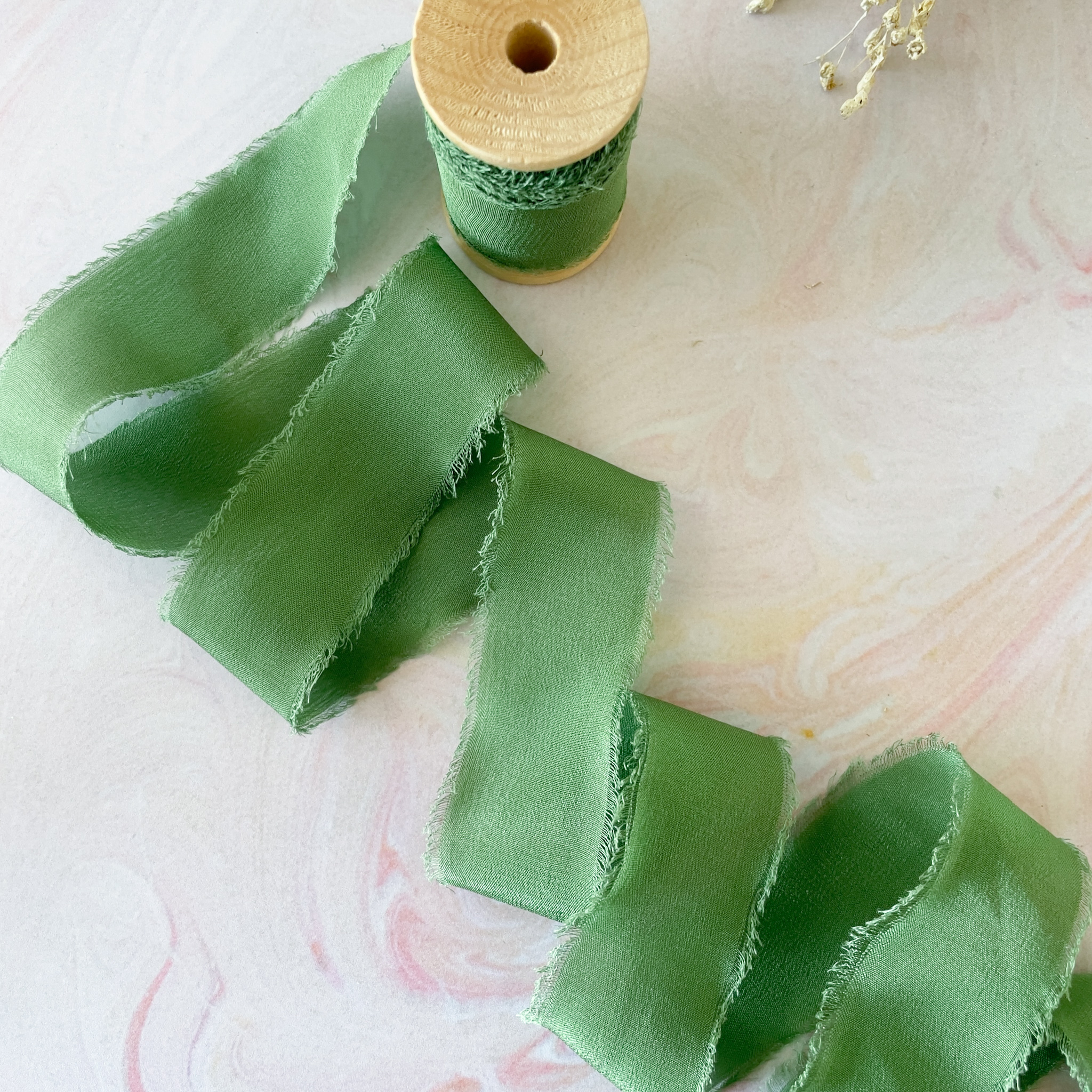 The Natural Paper Company – wholesale Ribbon – Gift wrapping – Emerald Green Silk Ribbon | Raw Edge Silk on a Wooden Reel0