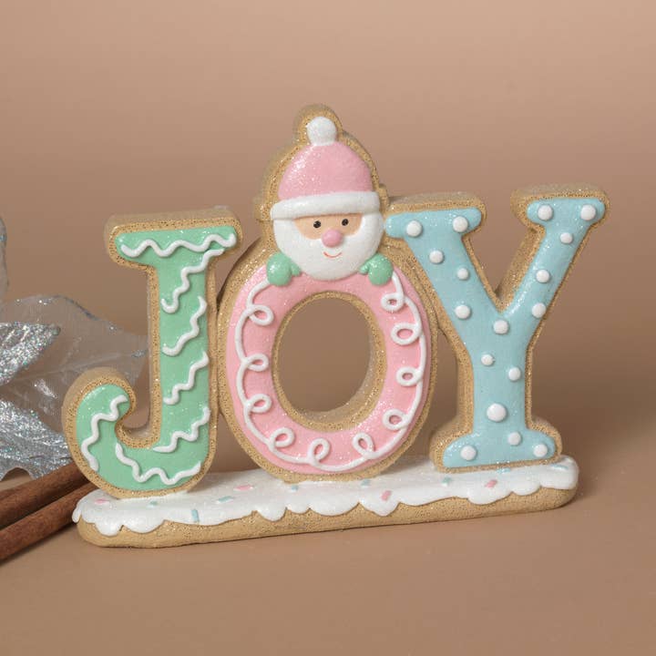 Gerson Christmas 7.28"L Resin Holiday Gingerbread "JOY" Tabl for wholesale by The Gerson Companies