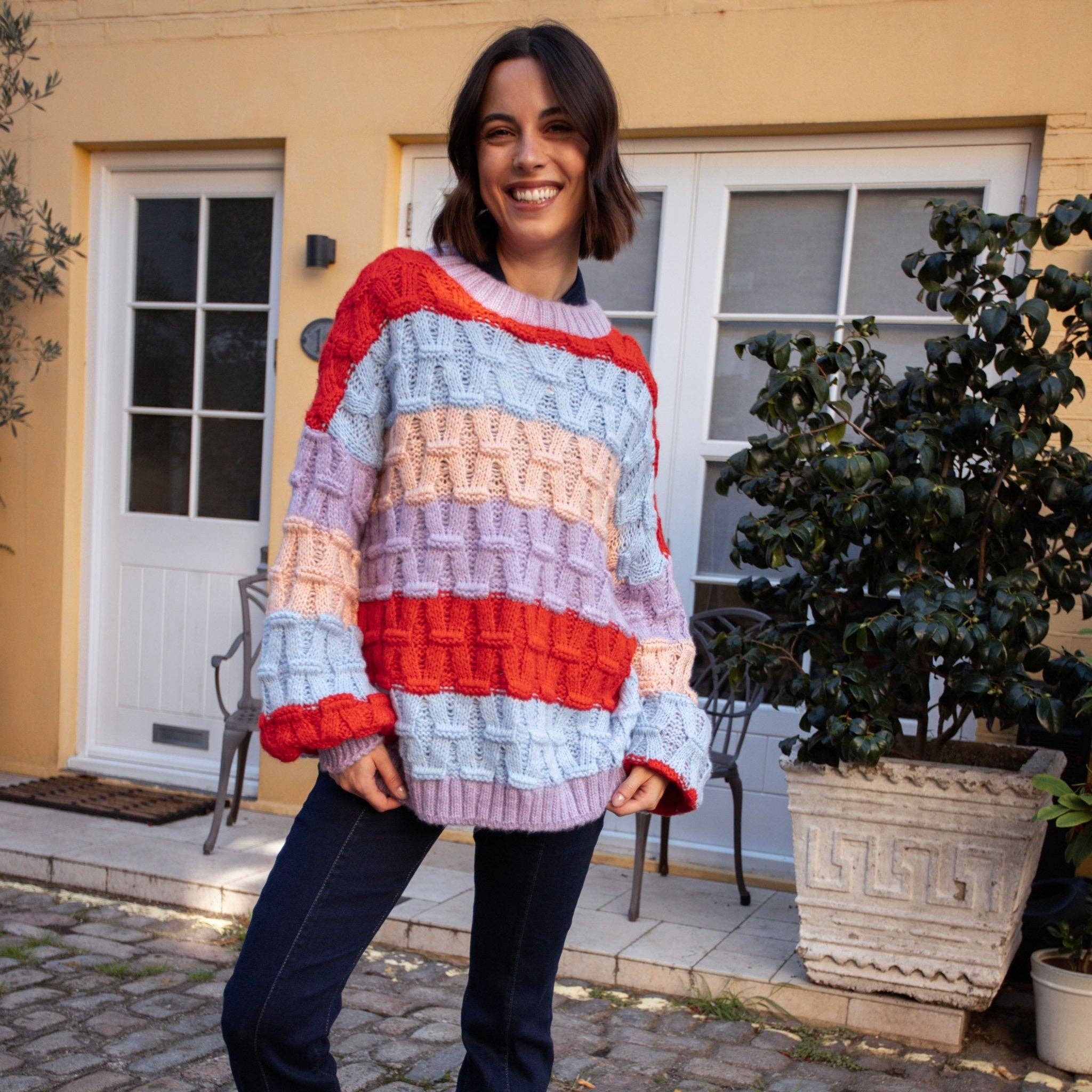 Cara & The Sky – wholesale Knitted jumper – Women′s – Mandy Criss-Cross Stitch Balloon Sleeve Stripe Jumper - Orange20