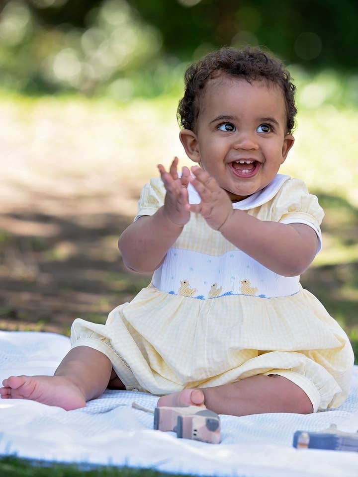 LITTLE DUCKS smocked romper for wholesale by Annafie London Ltd