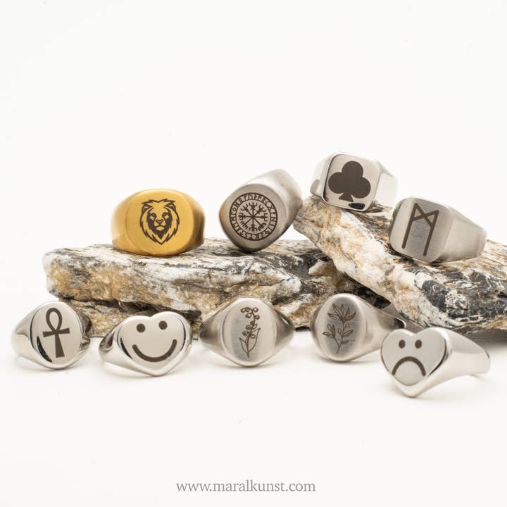 Tilpasset logo- og symbolgravering for engroshandel hos Maral Kunst