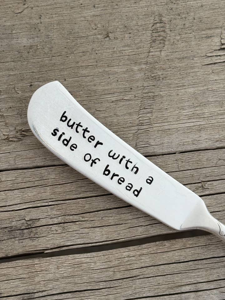 Manteiga com uma fatia de pão faca de manteiga por atacado de Pumpernickel and Wry