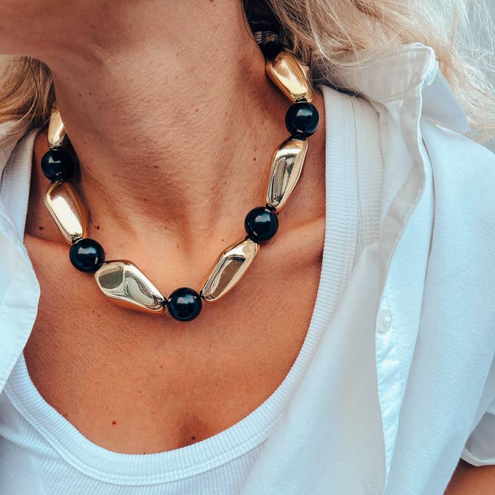 Chunky beaded necklace with gold and black geometric beads and other Purchase Wholesale chunky beaded necklaces. Free Returns & Net 60 Terms on Faire trending on Faire.