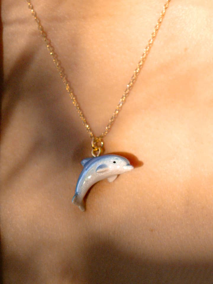 Tiny Dolphin Necklace for wholesale by Peter and June