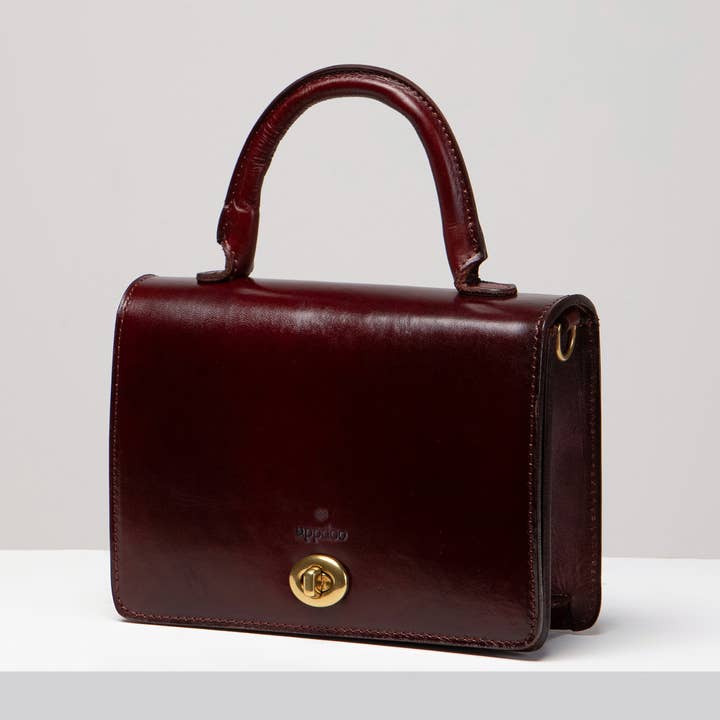 Turn-Loc Mini Satchel - Chestnut and other Purchase Wholesale posh backpack. Free Returns & Net 60 Terms on Faire trending on Faire.