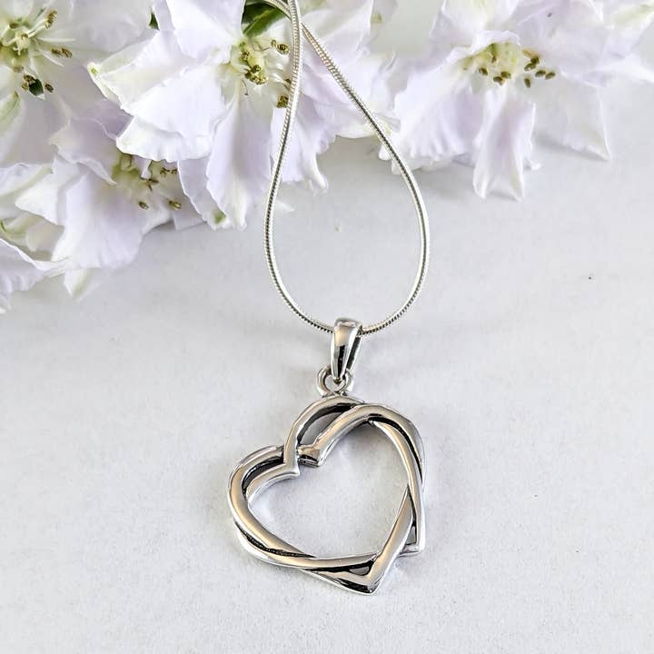 Entwined Hearts Pendant in Sterling Silver for wholesale by The Green Gecko
