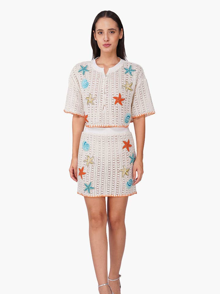 Set di 6 gonne con applicazioni all'uncinetto Coastel Patch (S, M e L) per la vendita all'ingrosso da parte di America & Beyond