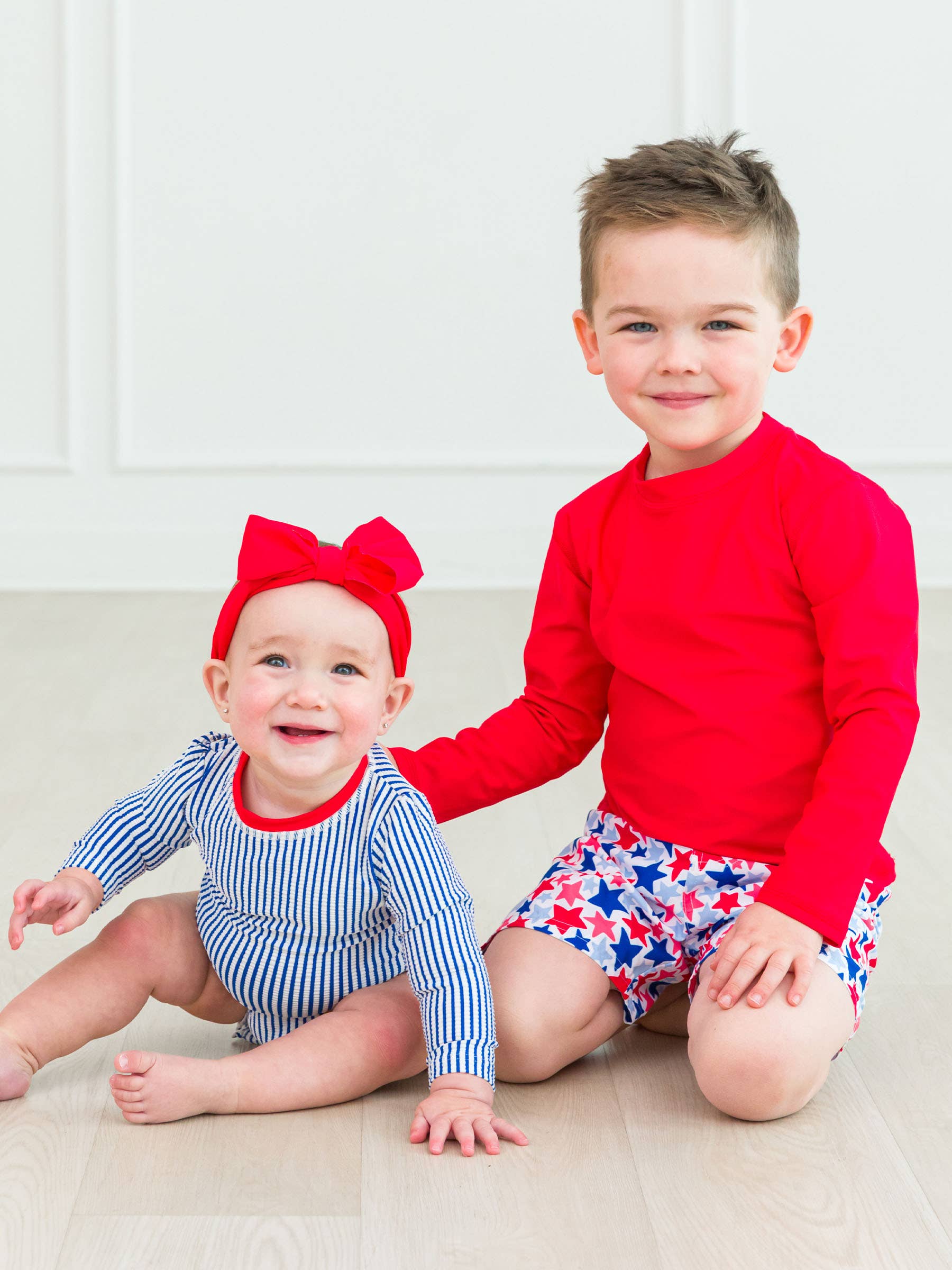 Boys Vintage Red Long Sleeve Rash Guard for wholesale on Faire5