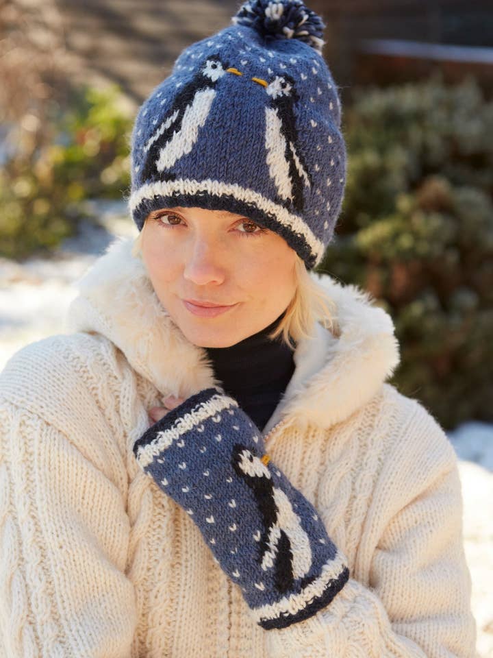 Waddle of Penguins Knitted Bobble Hat Tuxedo Bird Beanie for wholesale by Pachamama Ltd