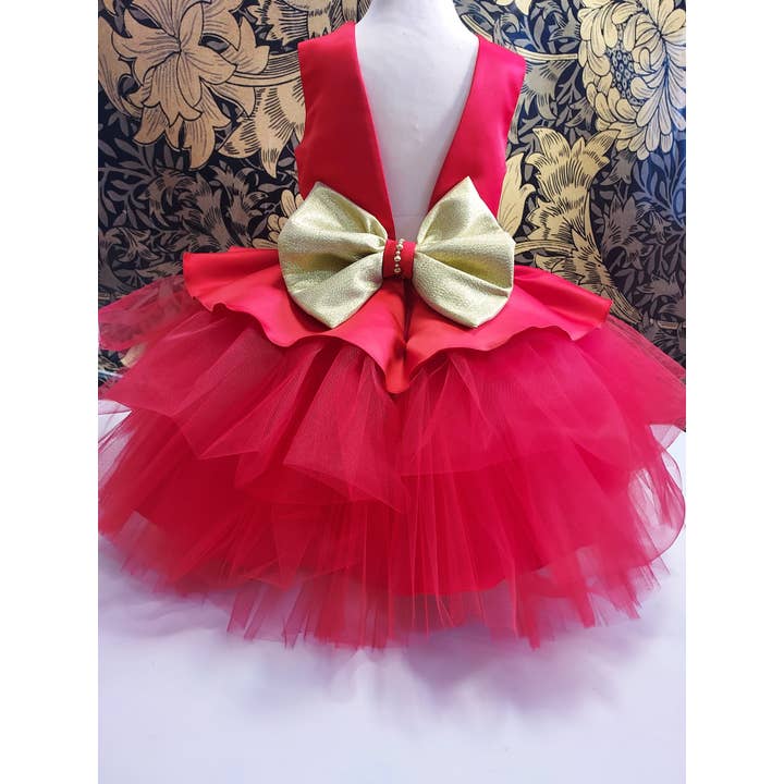 Abito bambina rosso per la vendita all'ingrosso da parte di Nenassibra