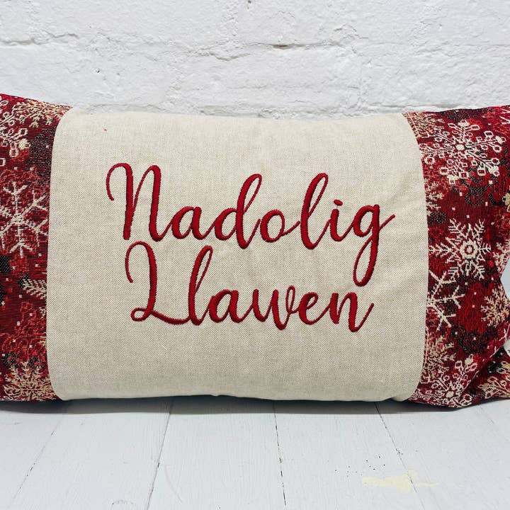 Nadolig Llawen Christmas Cushion- Snowflake Red and Gold Tapestry style cushion. for wholesale by Lizzie Dixon Designs