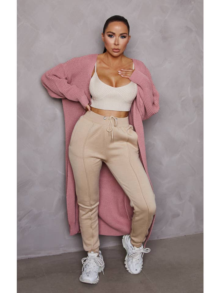 Femme Luxe – wholesale Kofta - Dam – Rosa stickad lång kofta med puffärmar i midi-längd - Vallmo2