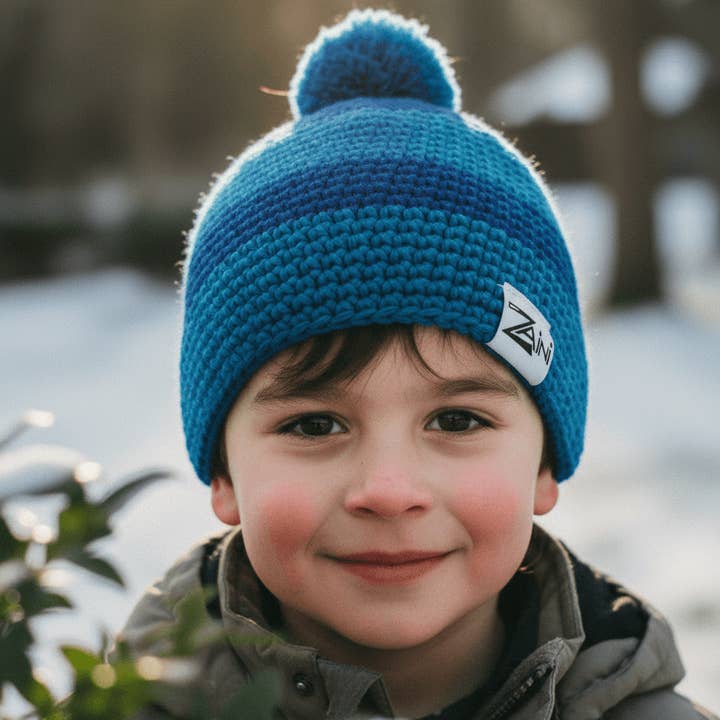 Cappellino con Pompon per Bambini Dalmally per la vendita all'ingrosso da parte di ZAINI Lifestyle Ltd