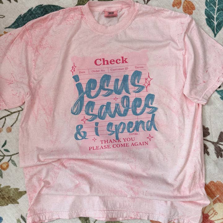 “Jesus Saves & I Spend” Graphic Tee for wholesale by Chandler’s Crafts and Creations