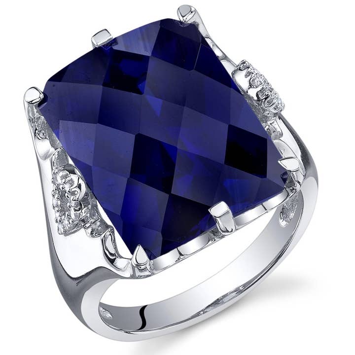 Created Blue Sapphire Radiant Cut Sterling Silver Ring Sz 5 for wholesale by Peliani