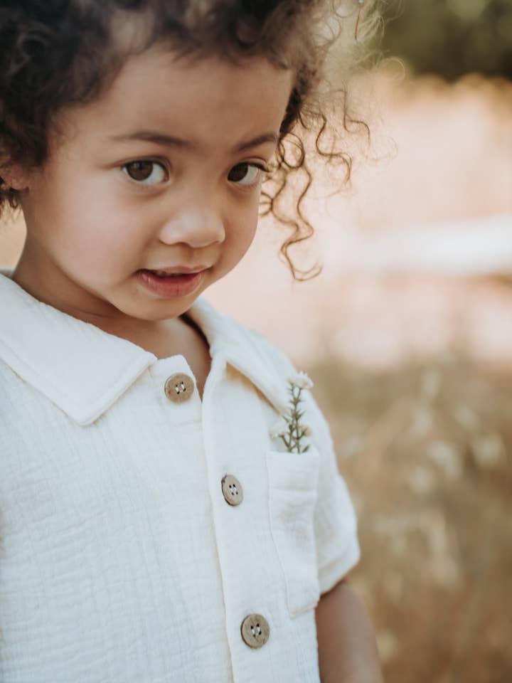 Organic short sleeve button up shirt in Cream for wholesale by Mimi & Me