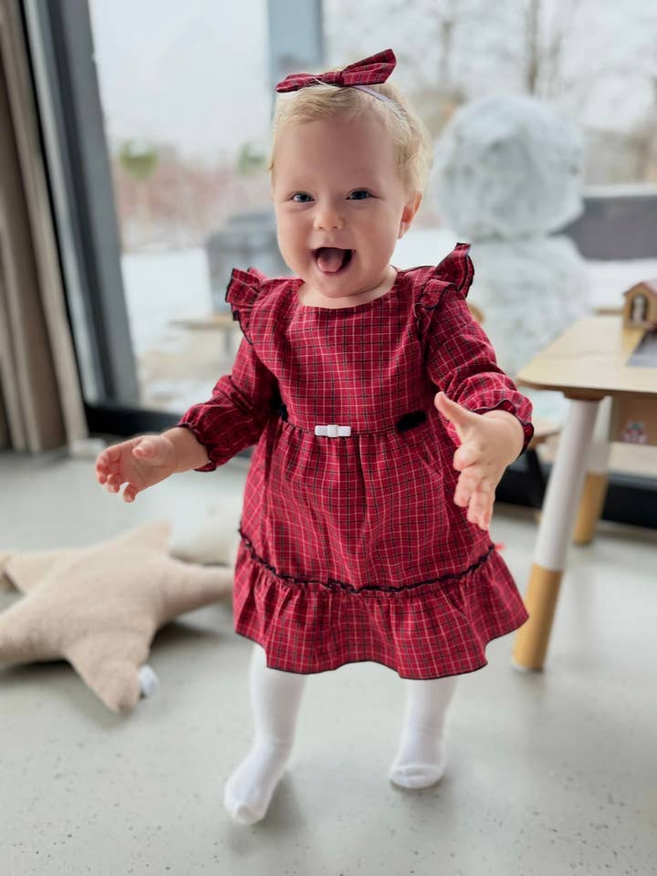 Julrutig bomullsklänning NANEA för wholesale av JAMIKS