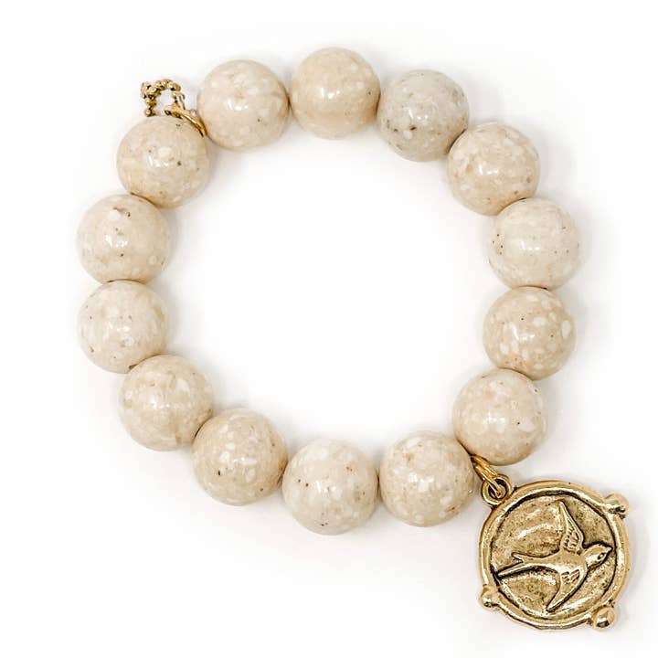 Cream Coral paired with an Exclusively Cast Bronze Sparrow for wholesale by PowerBeads by jen