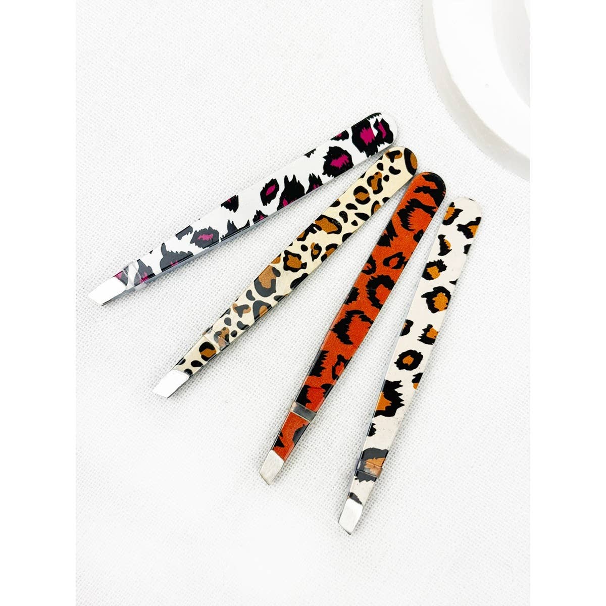 MIX COLOR Professional Leopard Eyebrow Tweezer for wholesale on Faire1