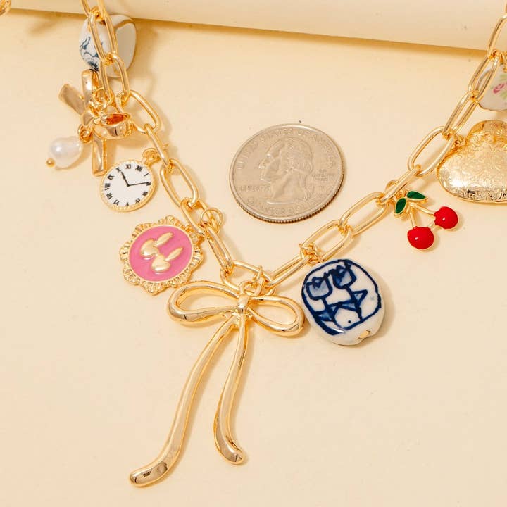 GD Assorted Floral Heart And Bow Charms Chain Necklace for wholesale on Faire
