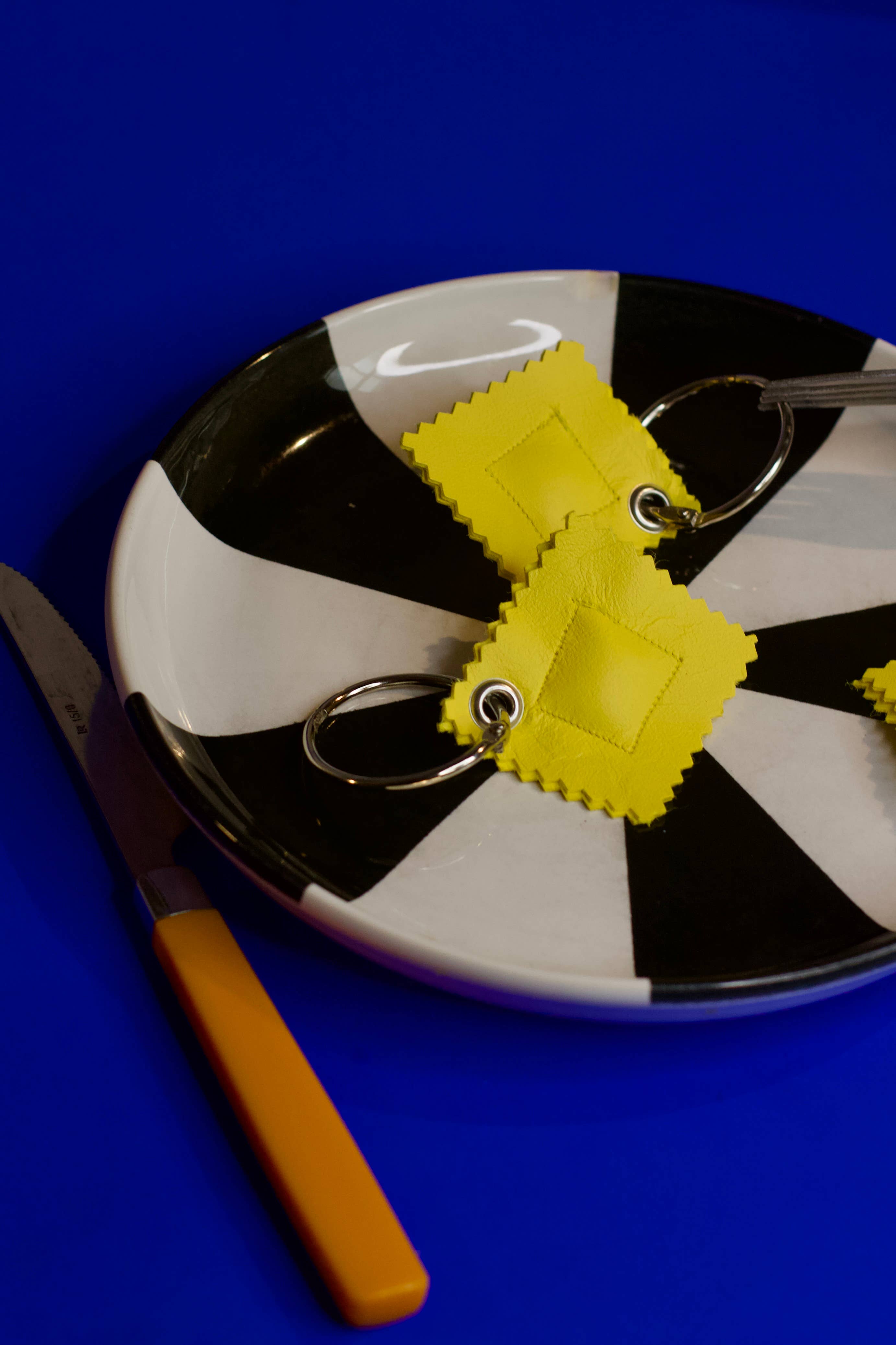 Pikto3000 - Wholesale Sleutelhanger - Uniseks - Leren Ravioli Hanger - Sleutel- of Tashanger1