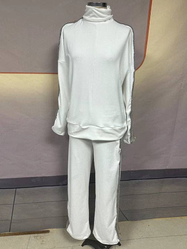 BLANC Ensemble de pulls et pantalons à col montant avec contraste de couleurs et sequins. en vente sur Faire5