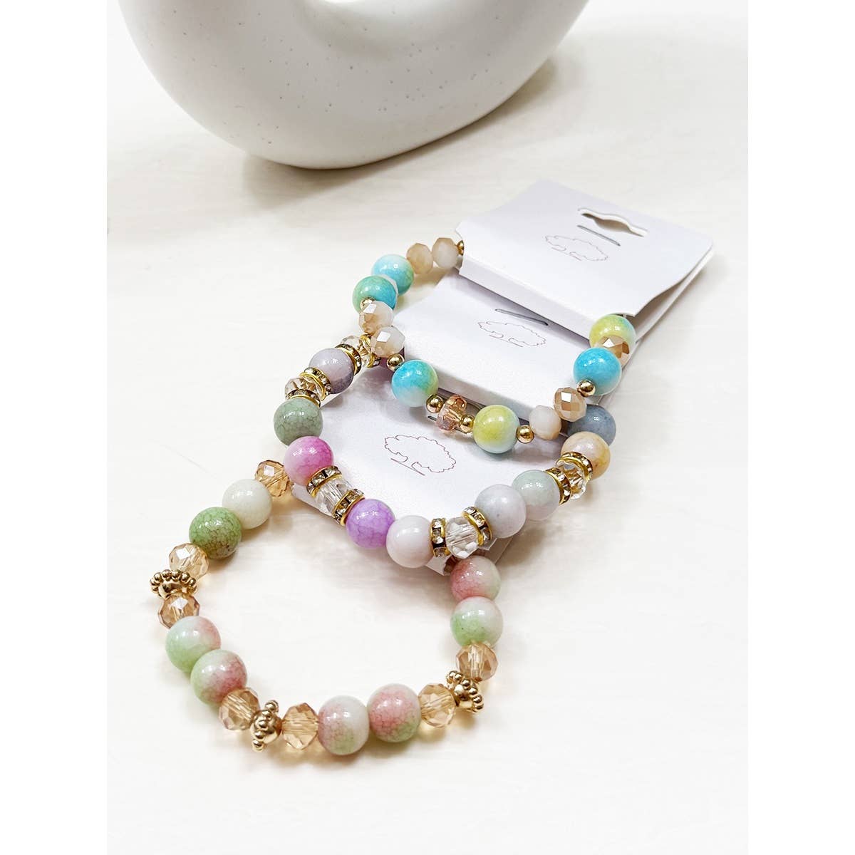 MÉLANGER LA COULEUR Bracelets extensibles en perles mélangées aux teintes douces en vente sur Faire3