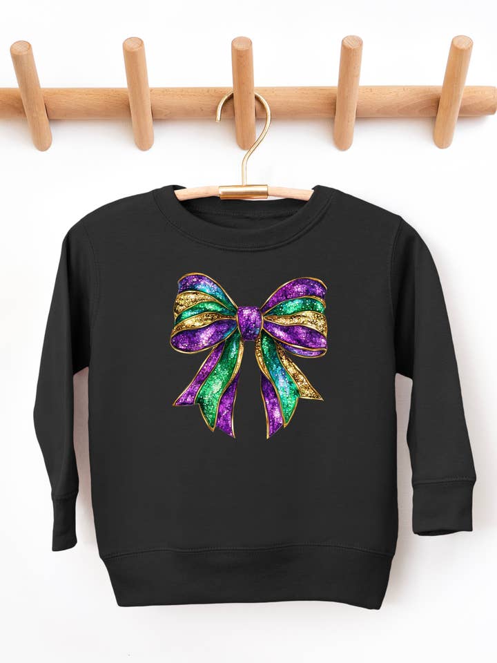 Faux Sparkly Mardi Gras Bow Toddler Graphic Sweatshirt for wholesale by Uncommon Label