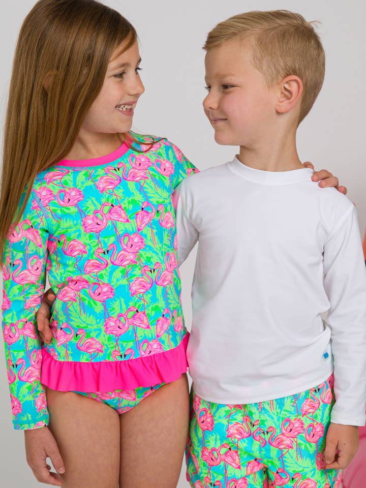 Blue Girls Neon Flamingo Fun Long Sleeve Rash Guard 2-Piece Swimsuit with Signature Rear Ruffles
for wholesale on Faire2