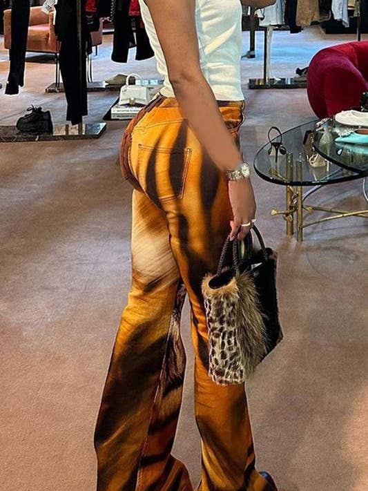 MARROM calças compridas com grafismo tigre para venda a revendedores na Faire1