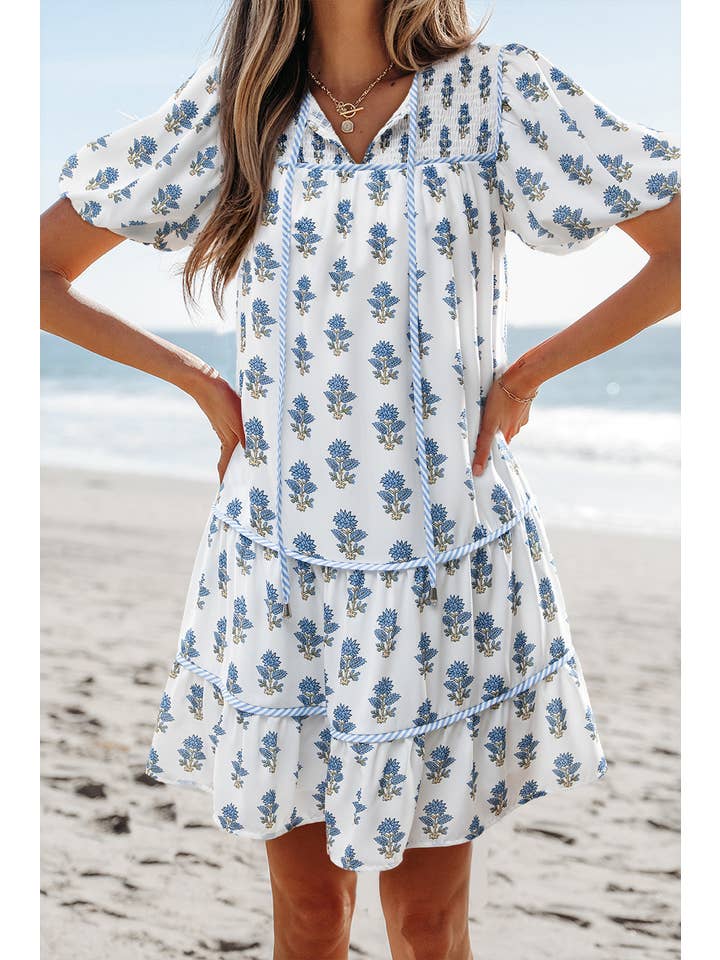 As shown Floral Puff Sleeve Tied Neck Pocketed Mini Dress | S-XL for wholesale on Faire