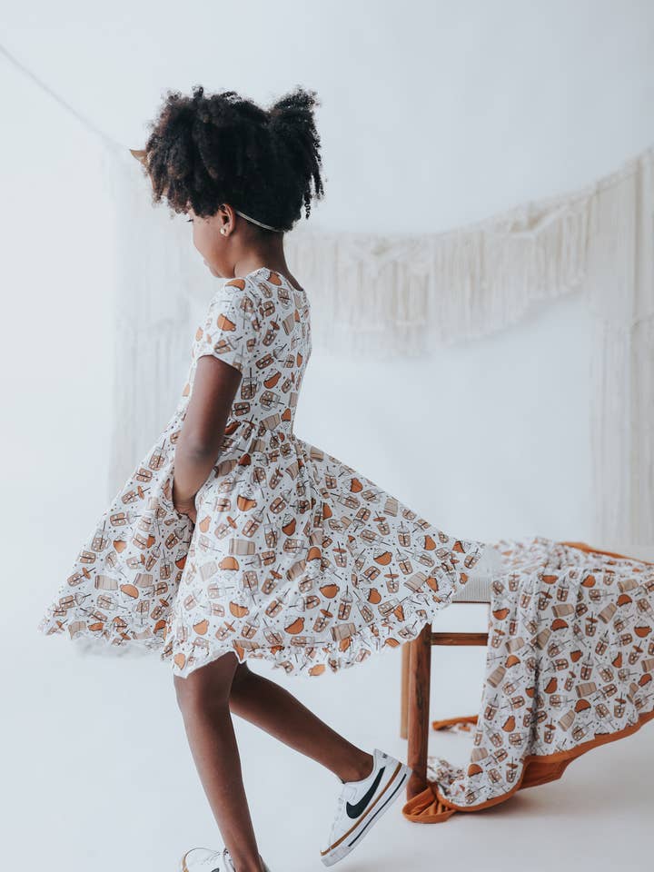 RISE AND GRIND DREAM RUFFLE DRESS for wholesale by Dream Big Little Co.