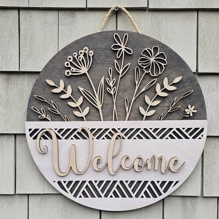 Personalized Floral Welcome Sign: Custom Wood Door Hanger (16 Inch) for wholesale by Southcoast Lasersmith