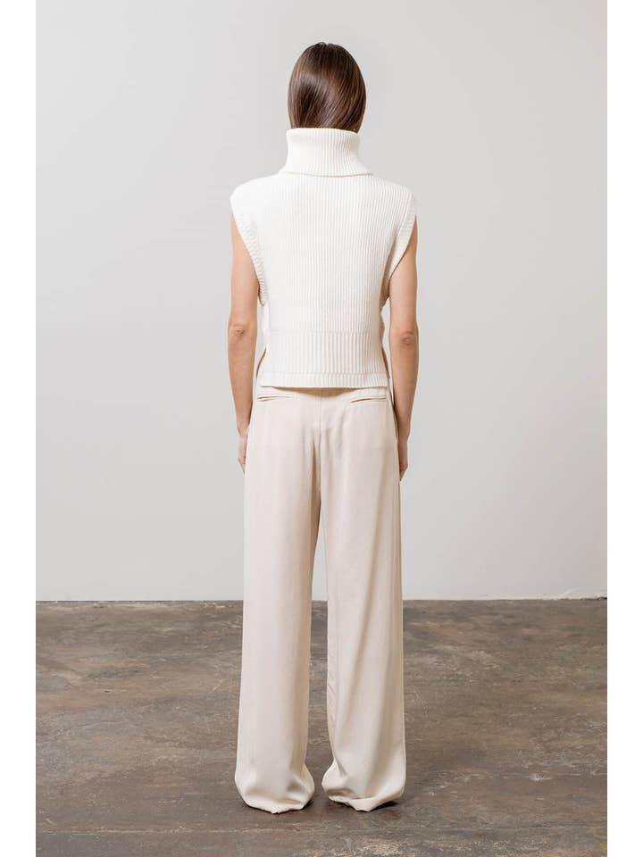 IVORY SLEEVELESS TURTLENECK PULLOVER SWEATER for wholesale on Faire