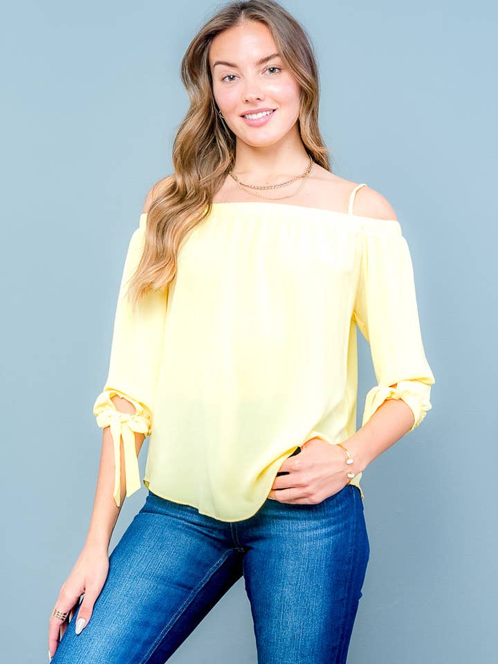 Off Shoulder blus med axelband, 3/4 ärmar, slipsar vid manschetten och svepfåll (T18325) för wholesale av Wholesale Fashion Couture