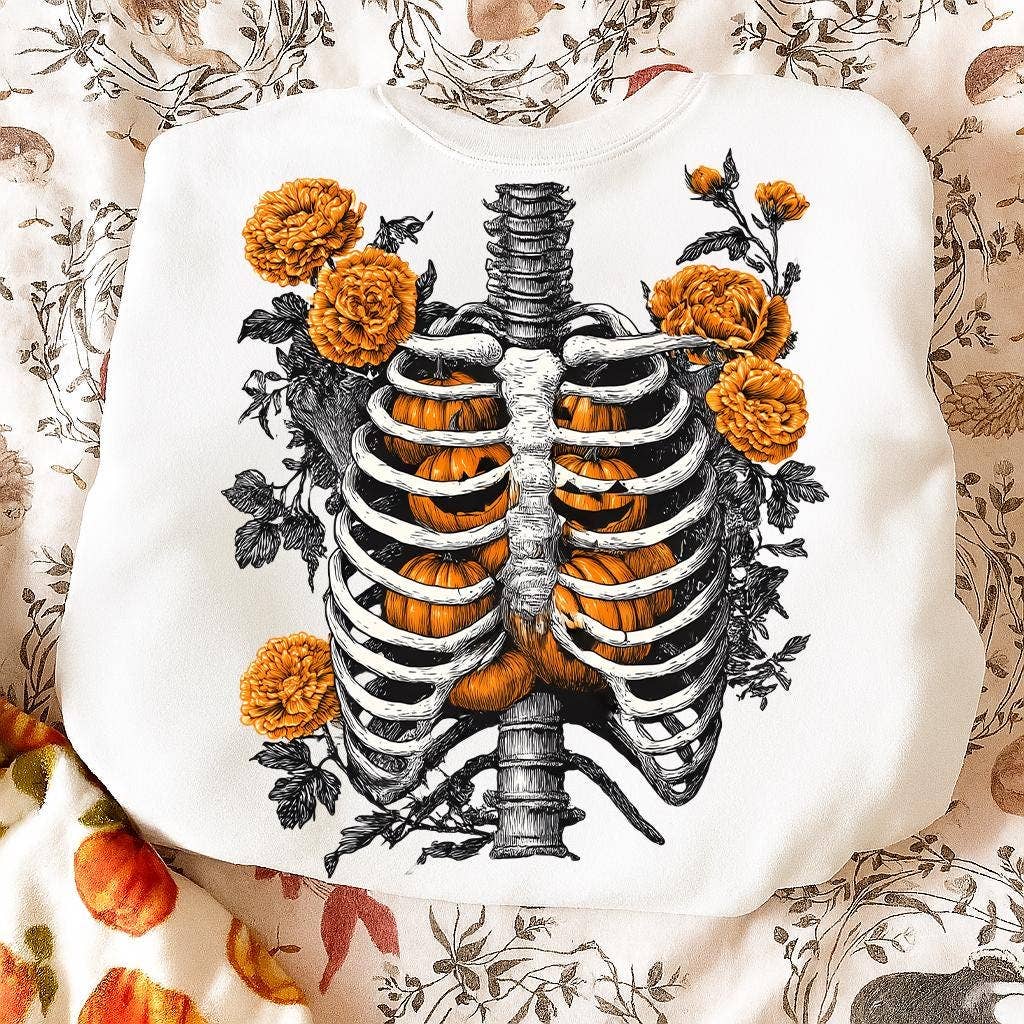 NVC Ecommerce LLC – T-shirt gráfica - Mulher por atacado – Camiseta de Abóboras com Caixa Torácica Floral, Sweatshirt de Outono com Esqueleto1
